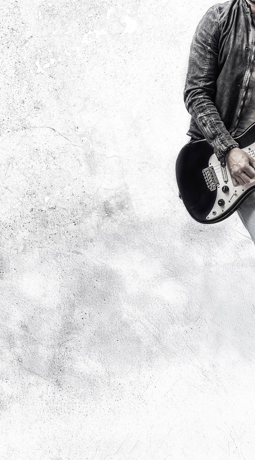 Musician holding electric guitar